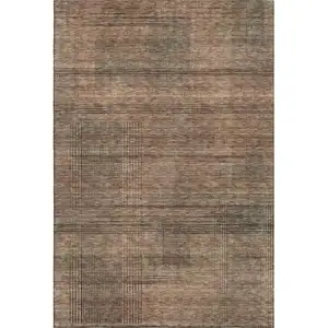 Photo of Rust And Gray Striped Washable Area Rug With UV Protection