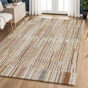 Photo of Rust And Gray Striped Washable Area Rug With UV Protection