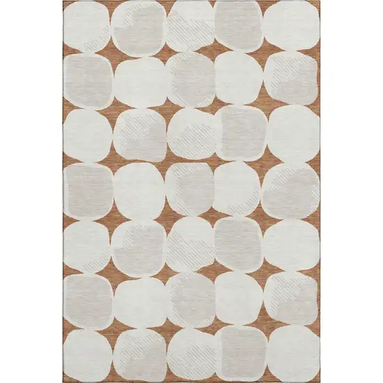 Rust And Ivory Abstract Geometric Washable Area Rug With UV Protection Photo 1
