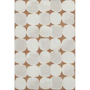 Photo of Rust And Ivory Abstract Geometric Washable Area Rug With UV Protection