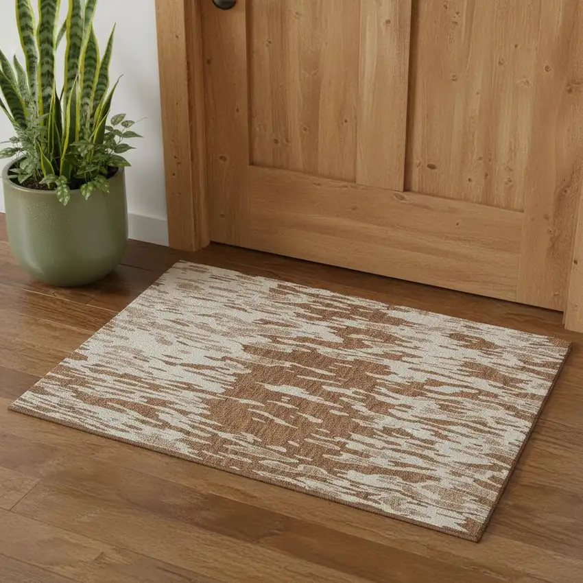 Rust And Ivory Abstract Washable Area Rug With UV Protection Photo 1