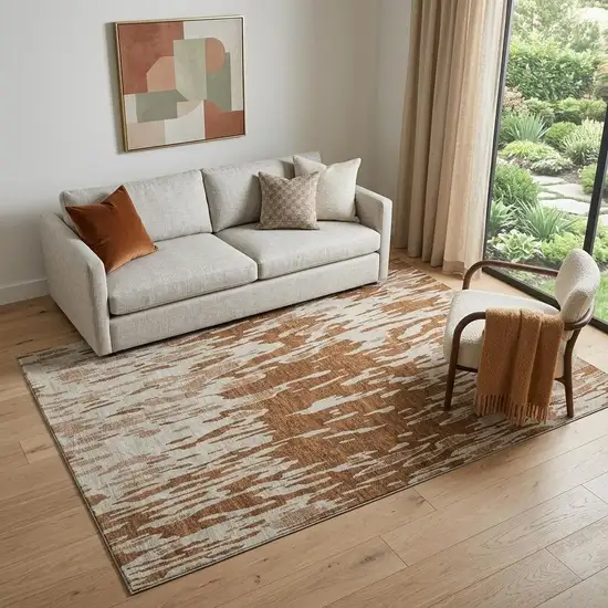 Rust And Ivory Abstract Washable Area Rug With UV Protection Photo 1