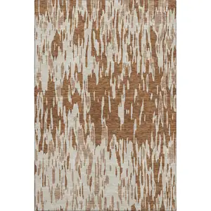 Photo of Rust And Ivory Abstract Washable Area Rug With UV Protection