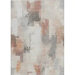 Photo of Rust And Ivory Abstract Washable Indoor Outdoor Area Rug
