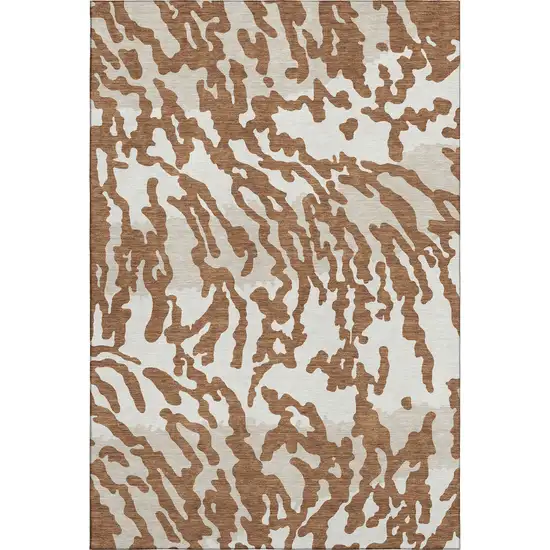Rust And Ivory Animal Print Washable Area Rug With UV Protection Photo 1