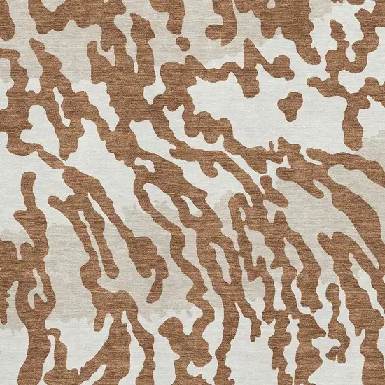 Rust And Ivory Animal Print Washable Area Rug With UV Protection Photo 3