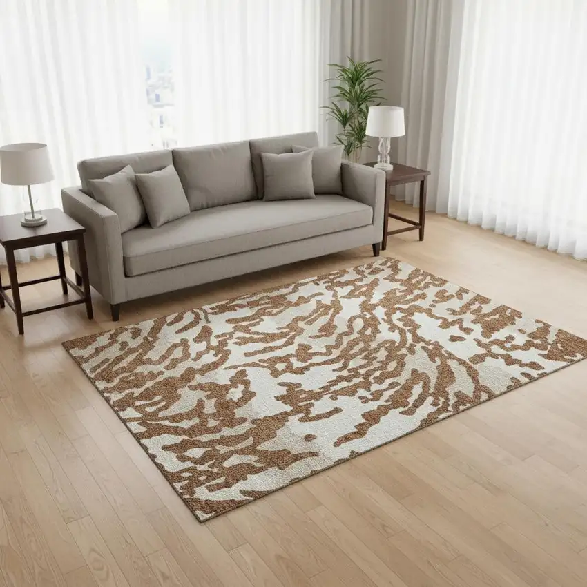Rust And Ivory Animal Print Washable Area Rug With UV Protection Photo 2