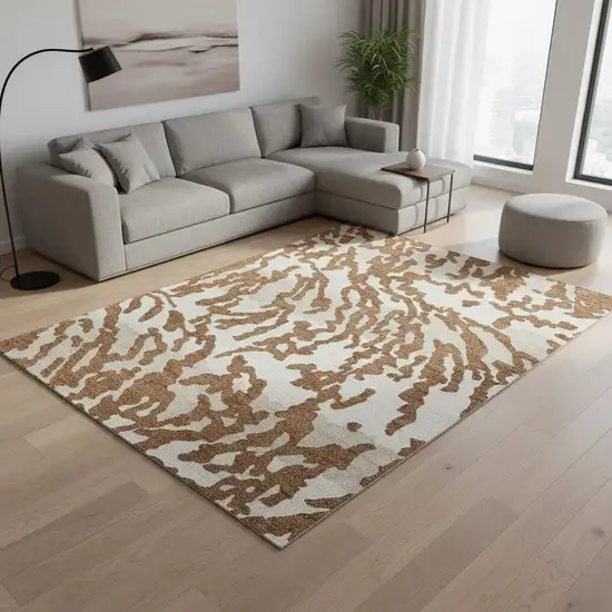 Rust And Ivory Animal Print Washable Area Rug With UV Protection Photo 2