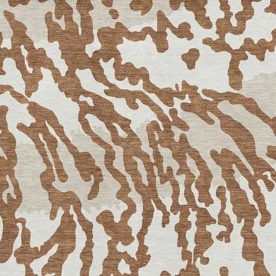 Rust And Ivory Animal Print Washable Area Rug With UV Protection Photo 3