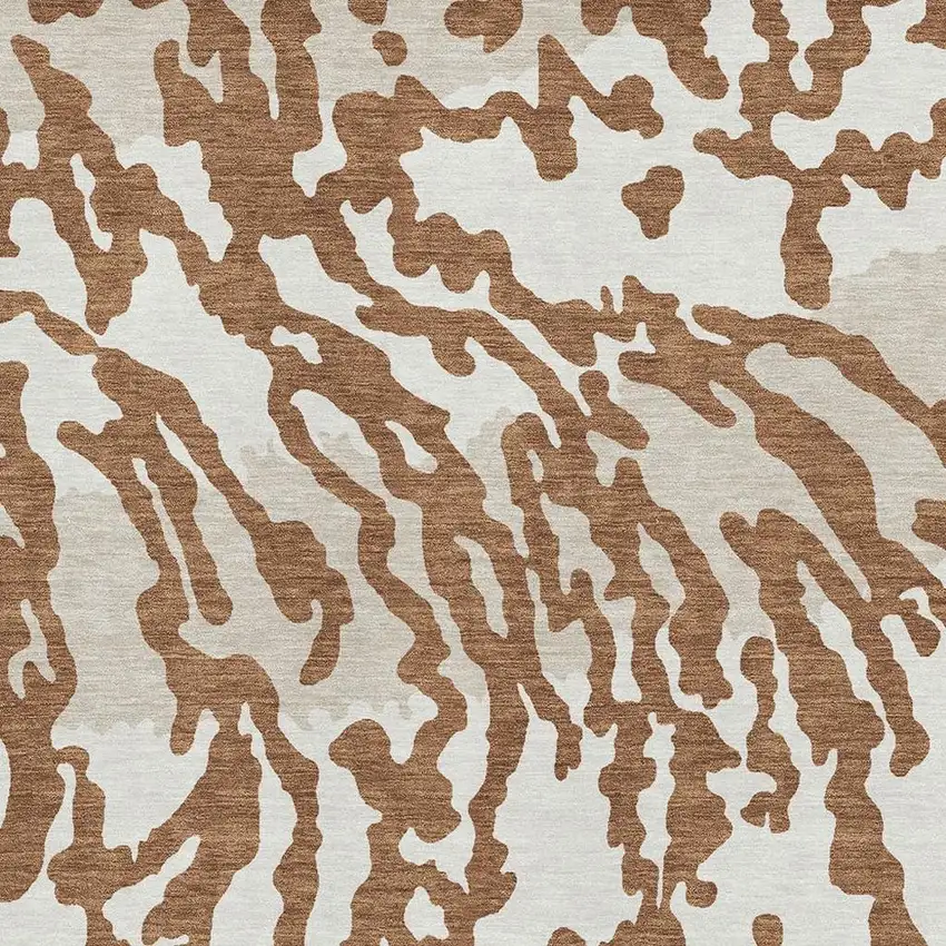 Rust And Ivory Animal Print Washable Area Rug With UV Protection Photo 3