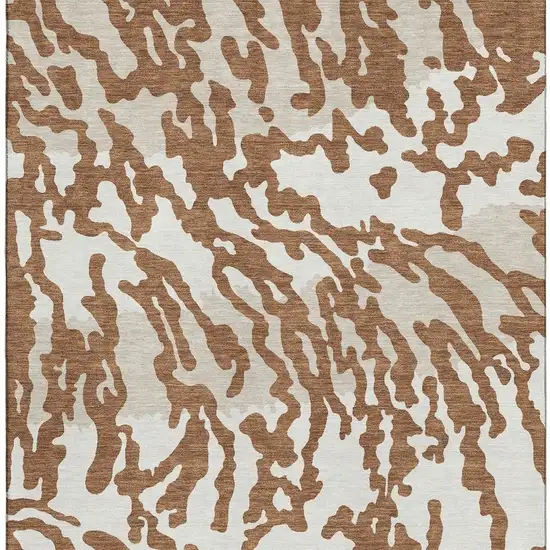Rust And Ivory Animal Print Washable Area Rug With UV Protection Photo 4