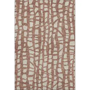 Photo of Rust And Ivory Cobblestone Washable Area Rug With UV Protection