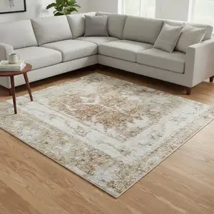 Photo of Rust And Ivory Floral Distressed Area Rug