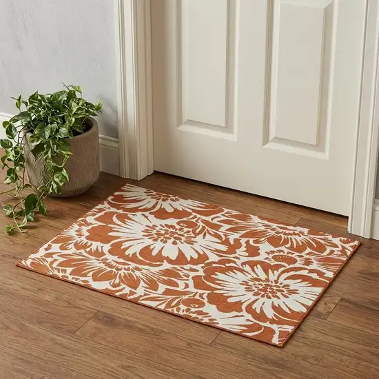 Rust And Ivory Floral Washable Area Rug With UV Protection Photo 1