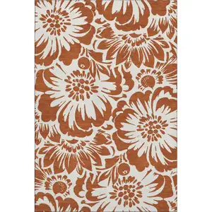 Photo of Rust And Ivory Floral Washable Area Rug With UV Protection