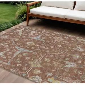 Photo of Rust And Ivory Floral Washable Indoor Outdoor Area Rug