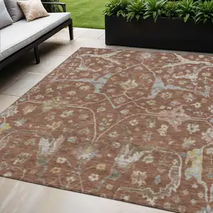 Photo of Rust And Ivory Floral Washable Indoor Outdoor Area Rug