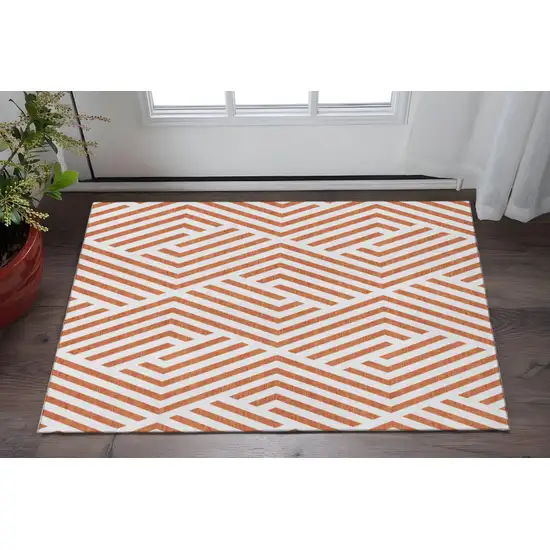 Rust And Ivory Geometric Washable Area Rug With UV Protection Photo 2