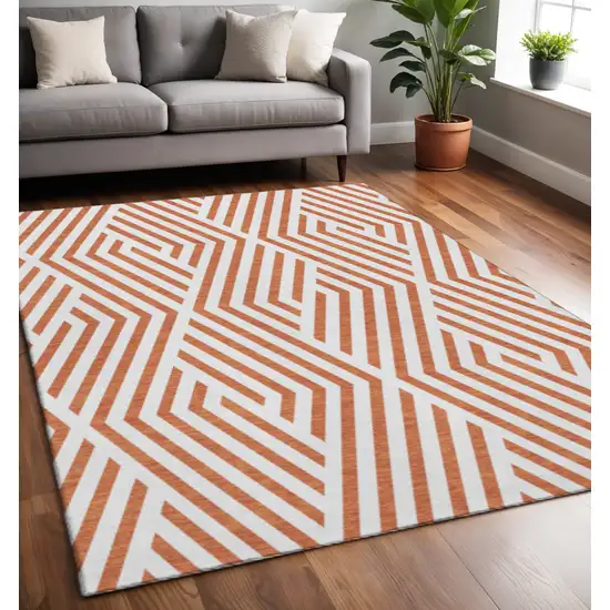 Rust And Ivory Geometric Washable Area Rug With UV Protection Photo 2