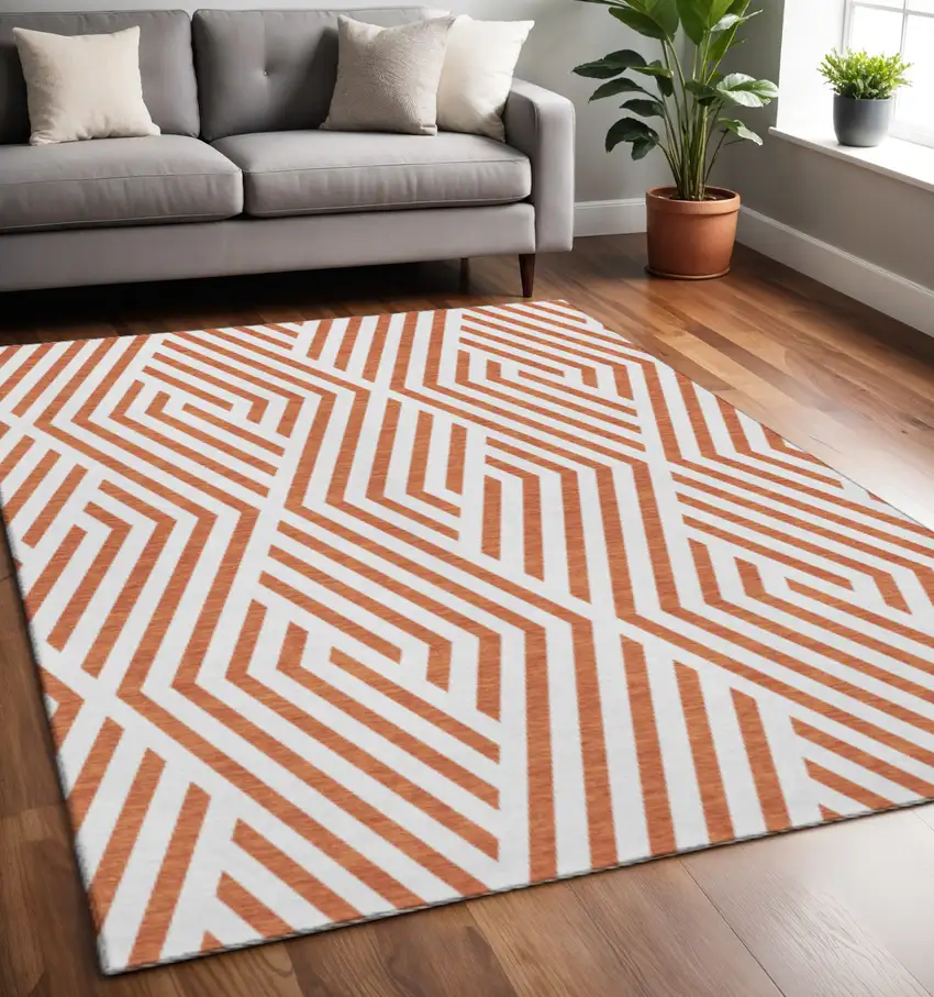 Rust And Ivory Geometric Washable Area Rug With UV Protection Photo 2