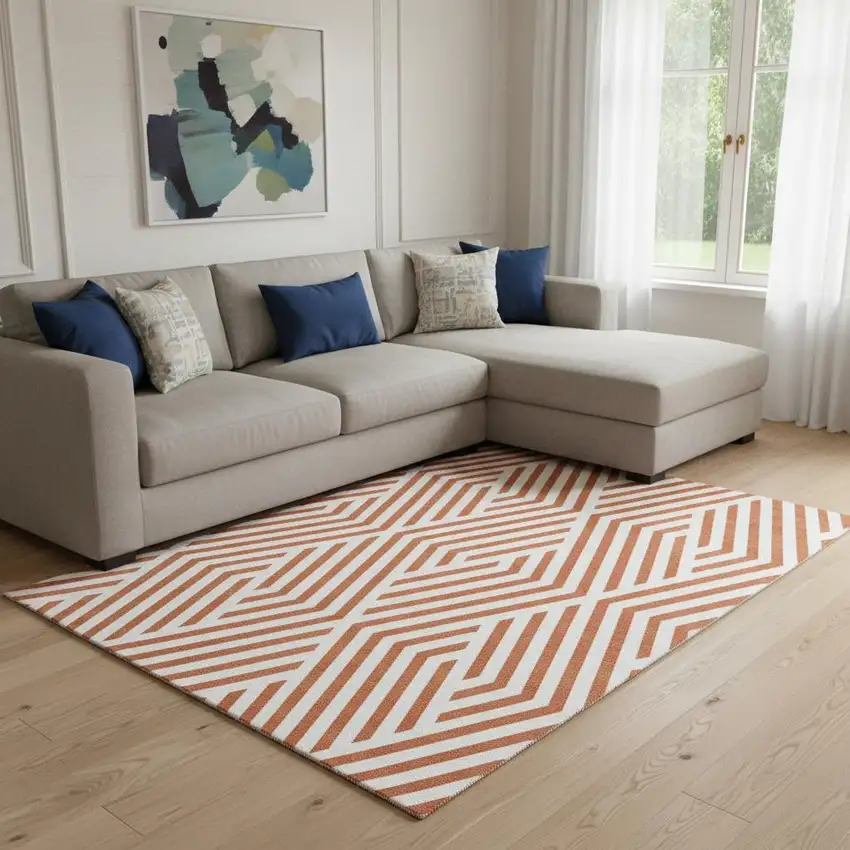 Rust And Ivory Geometric Washable Area Rug With UV Protection Photo 1