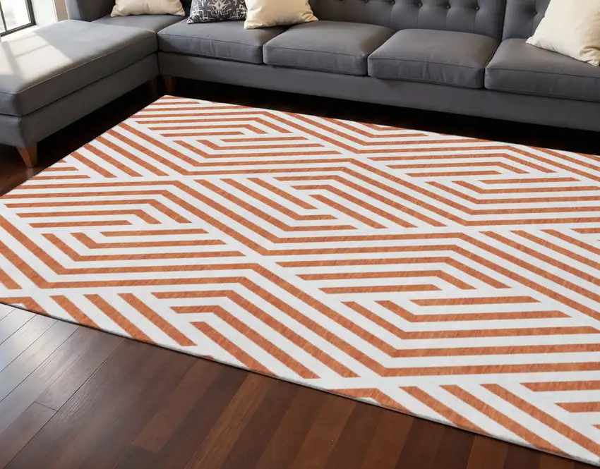 Rust And Ivory Geometric Washable Area Rug With UV Protection Photo 2