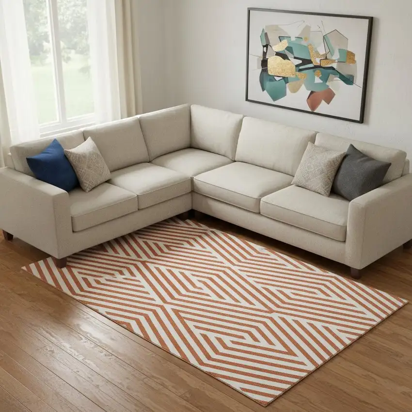 Rust And Ivory Geometric Washable Area Rug With UV Protection Photo 1