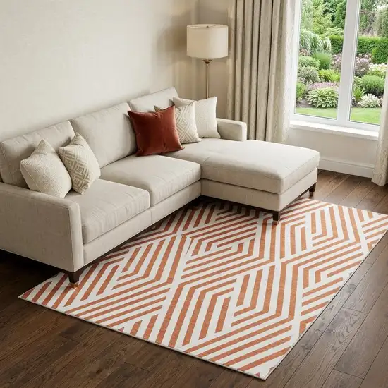 Rust And Ivory Geometric Washable Area Rug With UV Protection Photo 1