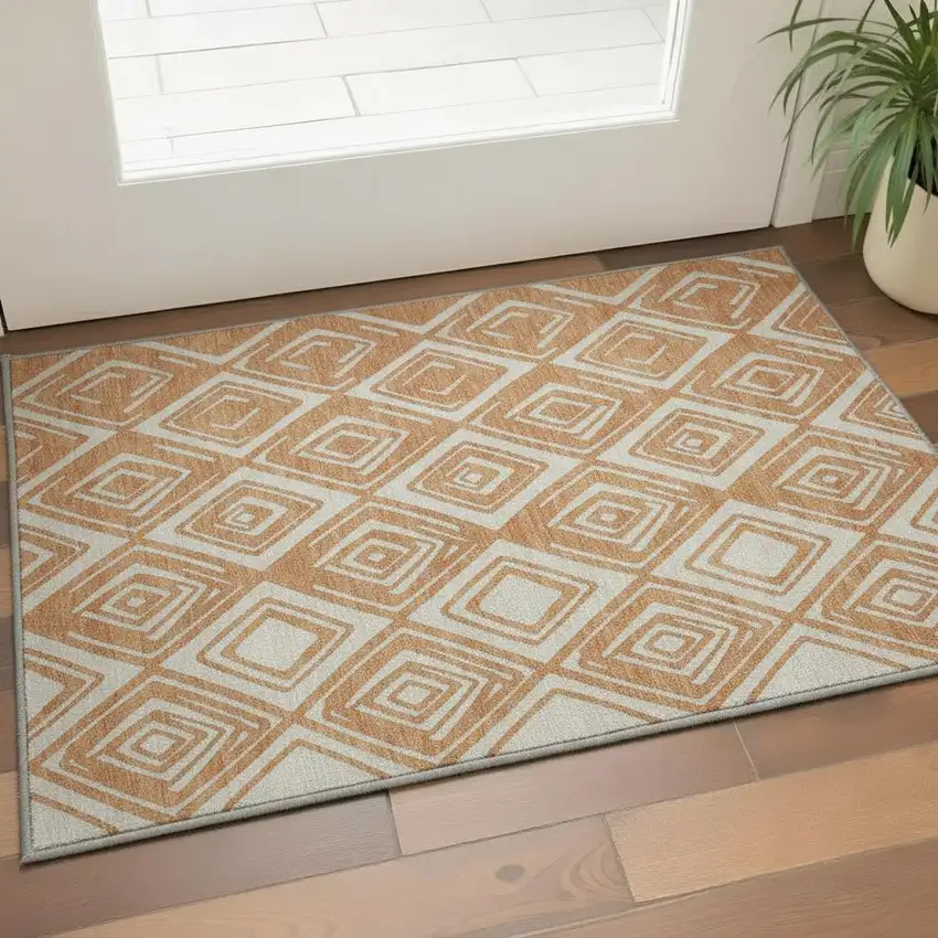 Rust And Ivory Geometric Washable Area Rug With UV Protection Photo 1