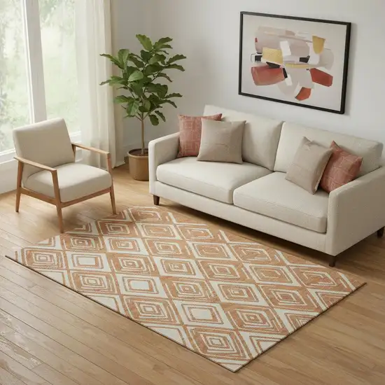 Rust And Ivory Geometric Washable Area Rug With UV Protection Photo 1
