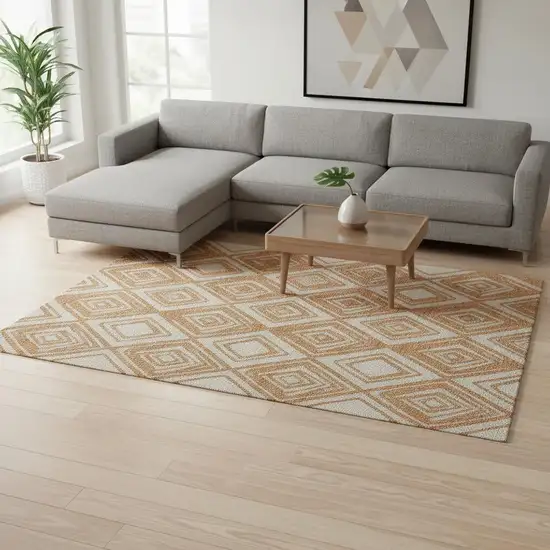 Rust And Ivory Geometric Washable Area Rug With UV Protection Photo 1
