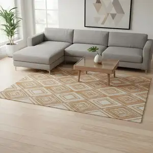 Photo of Rust And Ivory Geometric Washable Area Rug With UV Protection