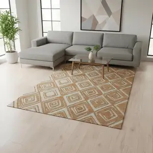 Photo of Rust And Ivory Geometric Washable Area Rug With UV Protection