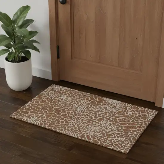 Rust And Ivory Geometric Washable Area Rug With UV Protection Photo 1