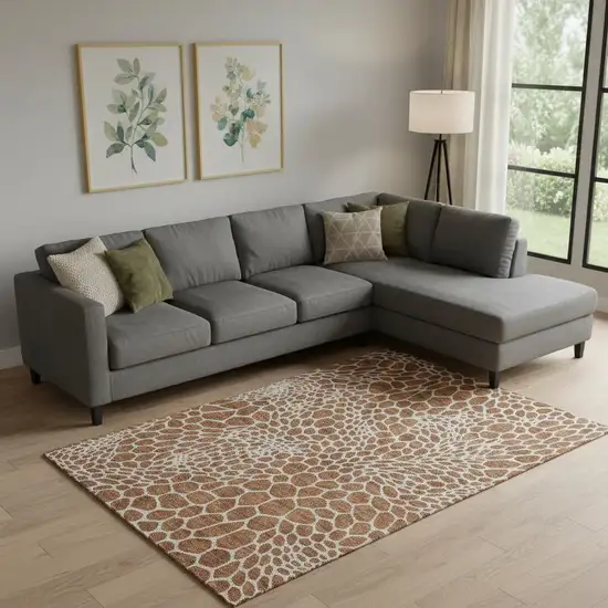 Rust And Ivory Geometric Washable Area Rug With UV Protection Photo 1