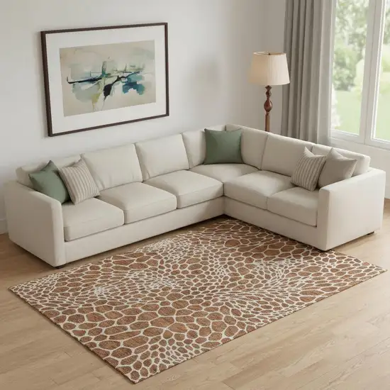 Rust And Ivory Geometric Washable Area Rug With UV Protection Photo 1