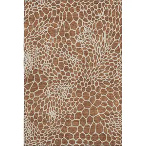 Photo of Rust And Ivory Geometric Washable Area Rug With UV Protection