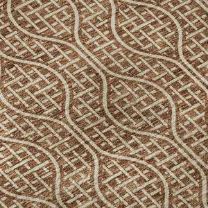 Photo of Rust And Ivory Geometric Washable Area Rug With UV Protection