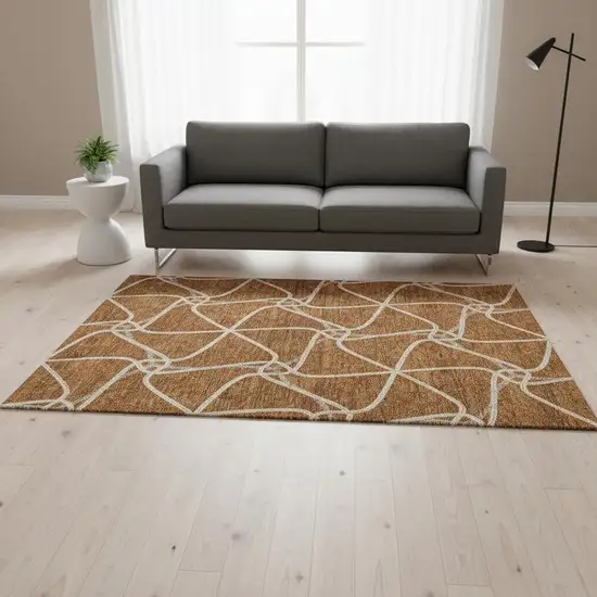 Rust And Ivory Geometric Washable Area Rug With UV Protection Photo 2