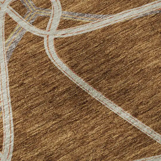 Rust And Ivory Geometric Washable Area Rug With UV Protection Photo 9