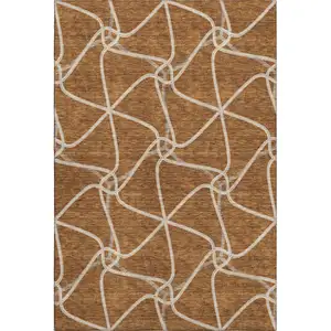Photo of Rust And Ivory Geometric Washable Area Rug With UV Protection