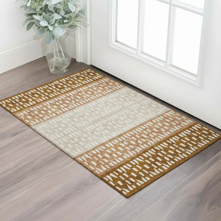 Rust And Ivory Geometric Washable Area Rug With UV Protection Photo 2