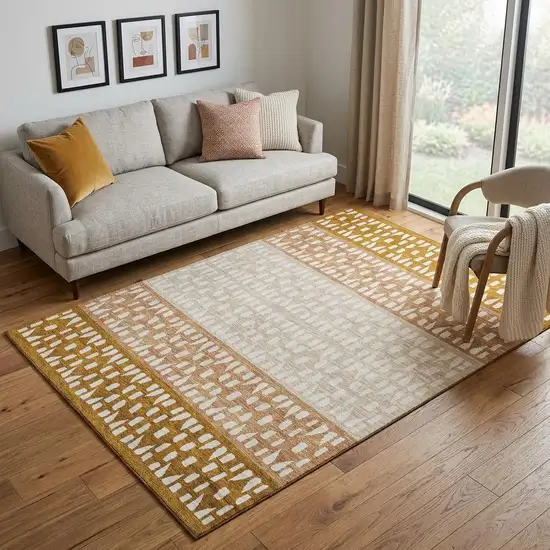Rust And Ivory Geometric Washable Area Rug With UV Protection Photo 1