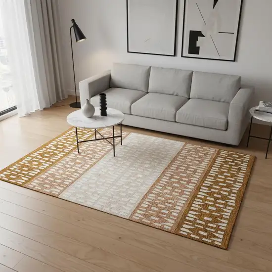 Rust And Ivory Geometric Washable Area Rug With UV Protection Photo 2