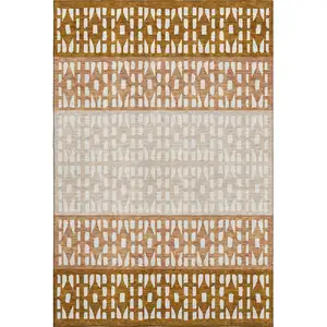 Photo of Rust And Ivory Geometric Washable Area Rug With UV Protection