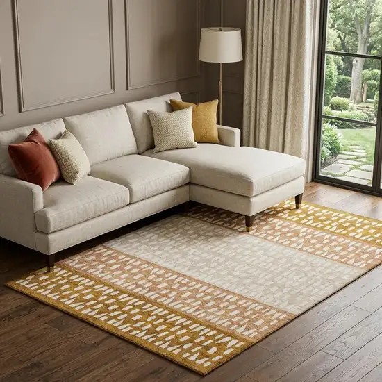 Rust And Ivory Geometric Washable Area Rug With UV Protection Photo 1