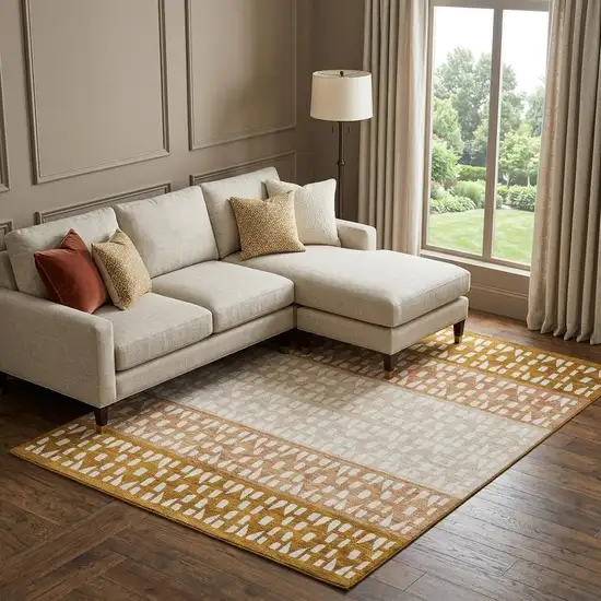 Rust And Ivory Geometric Washable Area Rug With UV Protection Photo 1