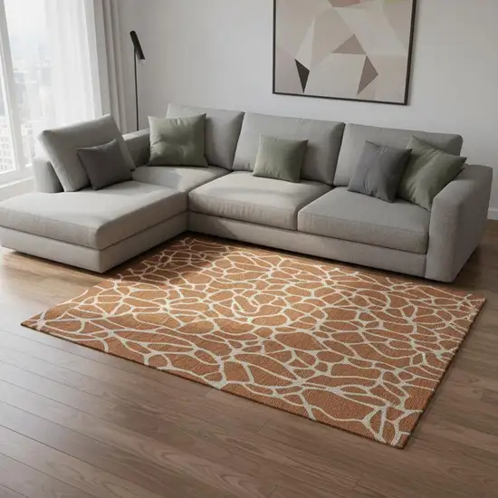 Rust And Ivory Geometric Washable Area Rug With UV Protection Photo 2
