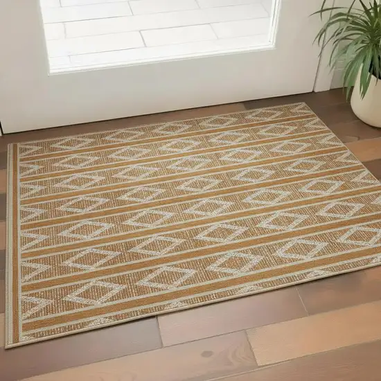 Rust And Ivory Geometric Washable Area Rug With UV Protection Photo 2