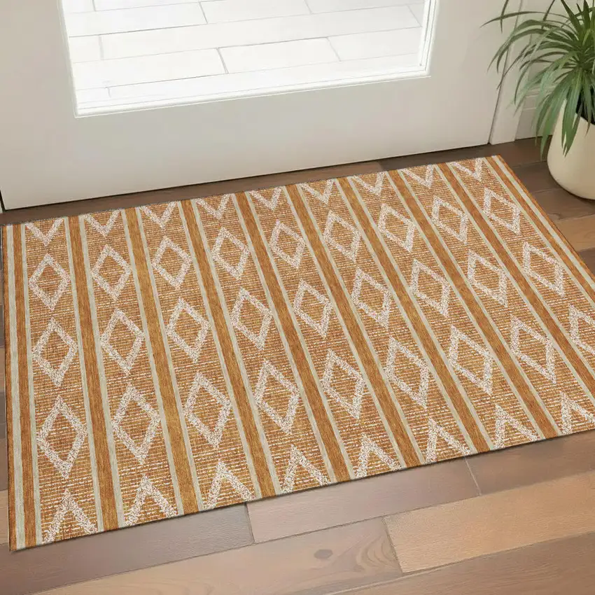 Rust And Ivory Geometric Washable Area Rug With UV Protection Photo 1